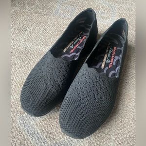Black Skechers slip on shoes